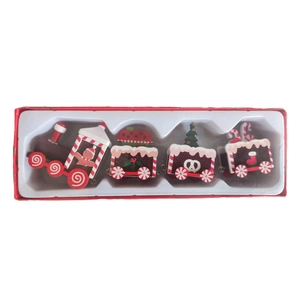 Close-up of wooden Christmas train set with gingerbread and candy cane details in box