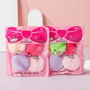 Close-up of a 4-pack makeup sponge set with ribbon handles in pink princess packaging