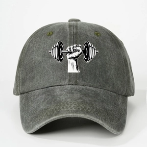 Macro shot of grey washed baseball cap featuring a black and white fitness dumbbell logo