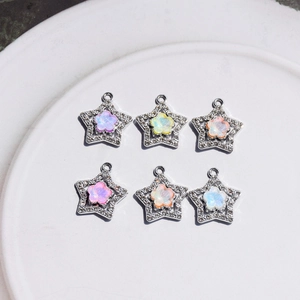 Star shaped pendants with macaron flower accents and rhinestones for DIY jewelry