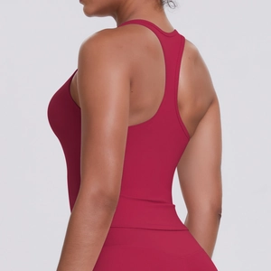 Close-up of racerback design on a burgundy sports vest with matte high-elastic fabric