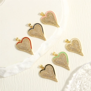 Fashionable copper zircon heart pendants in six colorful enamel finishes on white background