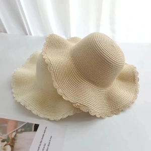 Summer wide brim straw sun hat with wavy lace trim in beige and creamy white