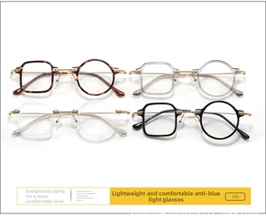 Detail showing asymmetrical spectacle frames in tortoiseshell, clear, grey and black colors
