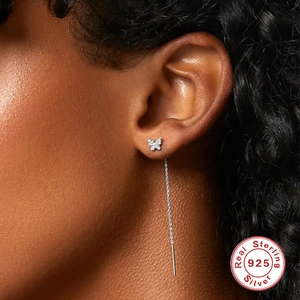 S925 sterling silver butterfly drop earrings with cubic zirconia chain on model