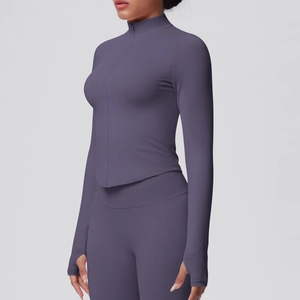 Slim fit stand collar yoga jacket with thumb holes and matching high waist leggings in purple