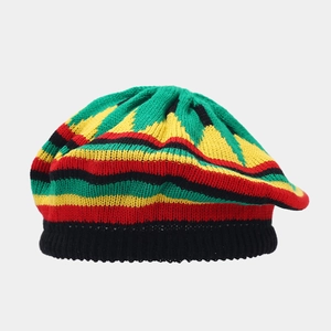 Close-up of Rasta knitted beanie with green, yellow, and red patterns for Halloween costume