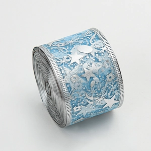 Light blue translucent Christmas ribbon with silver star patterns for gift wrapping