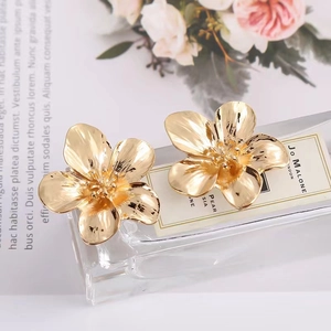 Elegant gold flower stud earrings with a 5-petal metallic bloom and polished finish