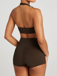 Rear view of dark brown halter neck bandeau top and high-waisted shorts set for women