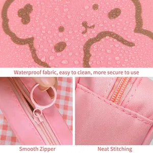 Pink waterproof cartoon bear sanitary napkin storage bag with smooth ring zipper