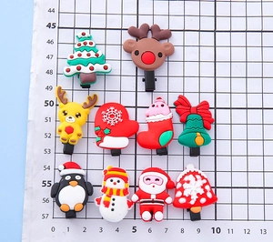 Vue détaillée de dix pinces à cheveux de Noël en PVC avec renne et bonhomme de neige