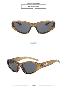 Detail of Y2K cyberpunk sunglasses with silver star emblem on brown resin frames