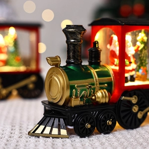 Detail view of a festive Christmas train night light with Santa Claus inside