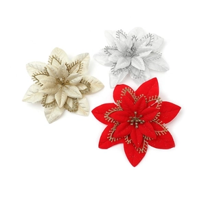 Detailed view of 3-layer glitter poinsettia flowers in red, gold, and silver colors