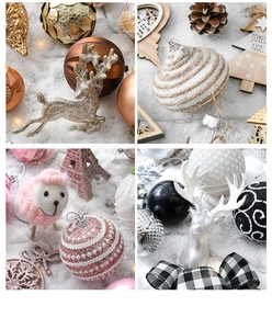 Detail of glitter reindeer and colorful Christmas balls on a snowy decorative background