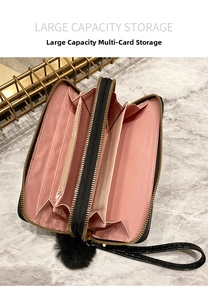 Detailed interior of crocodile pattern wallet showing multiple card slots and pink lining