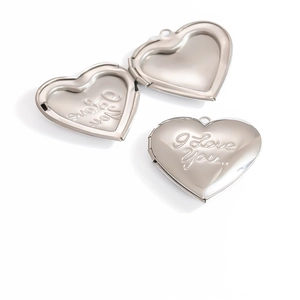 Polished silver heart locket pendant with I Love You engraving shown open and closed