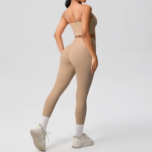 Detail view showing seamless nude yoga set with slim strap top and high-waist leggings