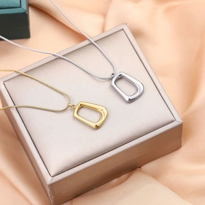 Minimalist geometric square pendant necklaces in gold and silver with sleek snake chains