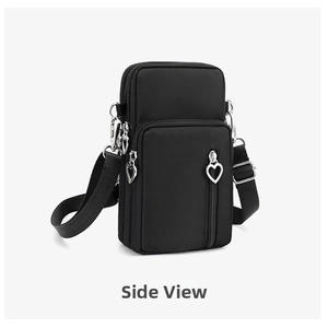 Side view of black nylon crossbody phone bag with multi-zipper layers and heart zipper pulls