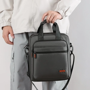 Men's dark gray business casual vertical messenger bag with multiple zipper pockets
