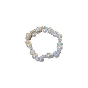 Handcrafted pearl and AB crystal beaded ring with French vintage style on white background
