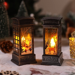 Close-up of retro Christmas telephone booth lanterns with Santa and elk patterns