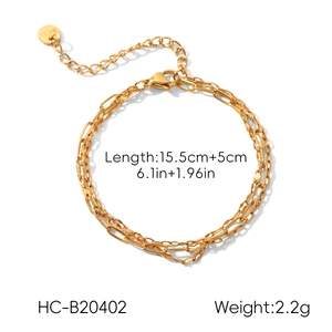 Detail view of 18k gold triple-layer stainless steel bracelet with adjustable 20.5cm chain