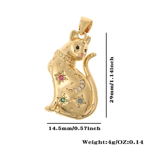 Detail view of gold cat pendant with star and moon patterns and size dimensions