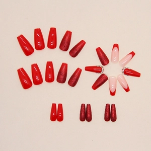 Red ballet press-on nails set with glitter, rhinestones and French tip trapezoid design