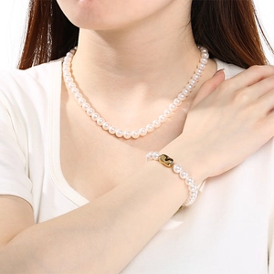 Ensemble de bijoux collier et bracelet en perles élégantes pour femme avec fermoir doré