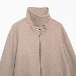 Women's oatmeal stand collar bomber jacket with metal zipper and button details