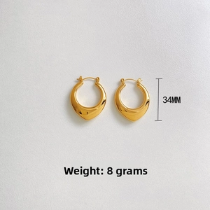 Polished hollow gold teardrop earrings size detail 34mm height and 8g weight