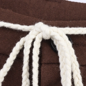 Ethnic style straight pants with dark brown linen fabric and white woven rope belt detail