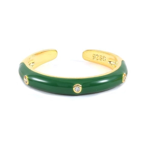 Close-up of gold-plated ring showing green enamel detail and S925 hallmark stamp