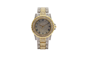 Detailed macro view of luxury quartz watch featuring Roman numerals and crystal encrusted dial