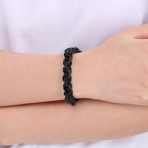 Close-up of black Byzantine chain bracelet on wrist showing detailed stainless steel link weave