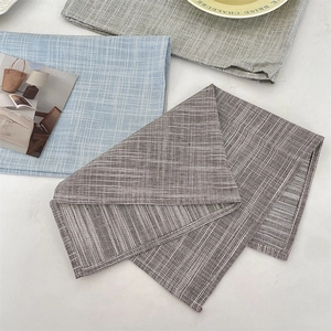 Detailed view of heat-resistant striped cotton linen placemats in multiple colors