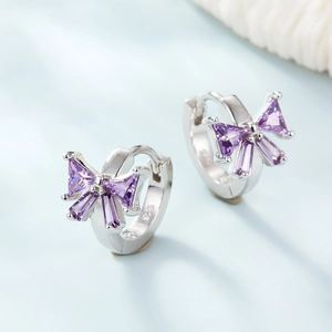 S925 sterling silver bow earrings with purple gemstones and natural shell pearl accents