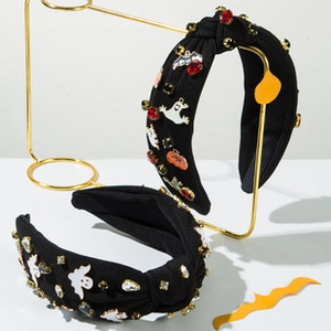 Detail of Halloween knot headbands with ghost patches and sparkling rhinestones