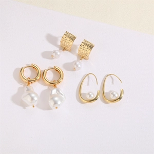 Baroque pearl gold earrings set with 14K gold plated hoops and irregular drop shapes
