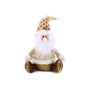 Detail of a Christmas gnome figurine with a sparkling gold sequin hat and white faux fur beard
