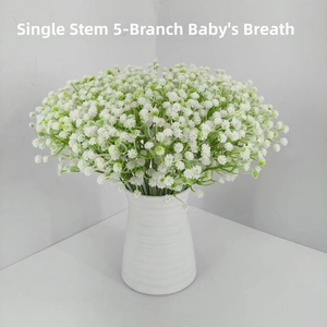 Detail of single white 5-fork gypsophila spray in a minimalist ceramic vase