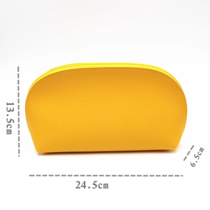 Pebbled yellow leather makeup bag detail showing dimensions 24.5cm by 13.5cm by 6.5cm