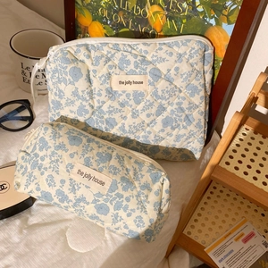 Quilted blue floral cotton cosmetic bags set with rectangular and cylindrical pouches