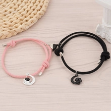 Braccialetti magnetici con astronauta e luna per coppie con cordino rosa e nero