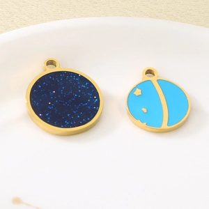Starry sky round glass pendants in gold plating with dark blue glitter and enamel finish