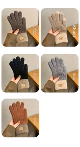 Multi-color thermal knitted gloves featuring touchscreen tips and branded leather patch detail