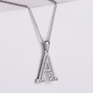 Polished silver titanium steel necklace with rhinestone A-letter pendant on stone base